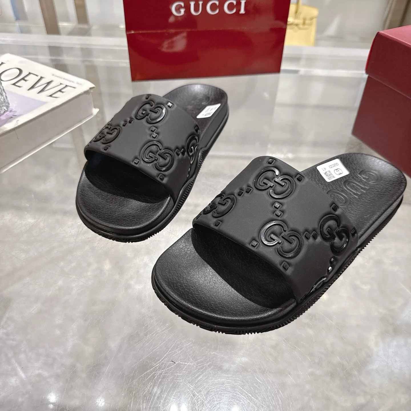 🅿️300💰 🌹Gucci official website Good Game slippers and sandals for men and women. In this special edition series, the acronym of the brand founder Guccio Gucci gives new meaning. In the gaming world, "GG" is a symbol of good sportsmanship and stands for "Good Game," which conveys the value system of the community. The modern acronym is a playful ode to the brand’s origins in the world of sports and leisure, illustrating how Gucci’s heritage continues to evolve. The parting greeting expresses the Gucci Good Game motto as the brand moves into new worlds, creating centers of play, self-expression, talent, freedom and individuality. Made with a rubber upper, these slippers are embellished with the collection's signature logo.  Rubber upper, unisex, G logo embossed, molded footbed, rubber sole, flat, made in Italy, sizes 36 to 46